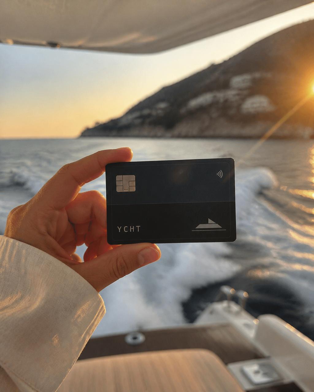 YCHT card held aboard a yacht